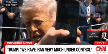 Chaotic moment disrupts Trump’s press gaggle as heckler shouts ‘stop the bloodshed!’