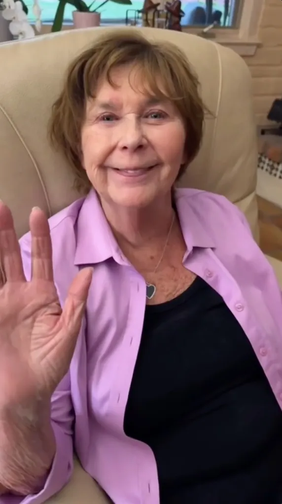 Nancy Guthrie, Savannah Guthrie's mother, smiles at the camera while waving.