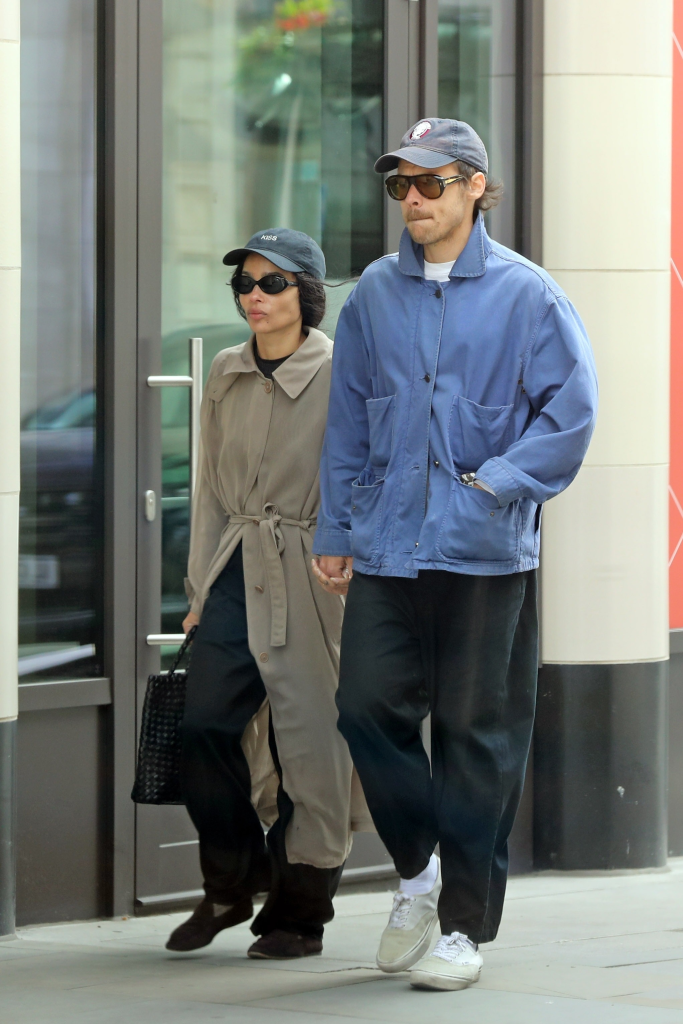 Harry Styles and Zoë Kravitz holding hands while walking in London.