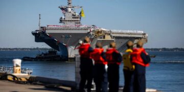 World’s largest aircraft carrier returns from 11-month deployment, longest since Vietnam, after supporting Iran war and Maduro raid