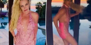 Britney spears slaps her butt while dancing in hot pink mini dress following reported restaurant drama
