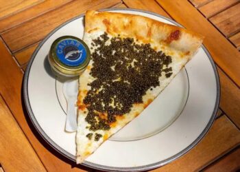 Philadelphia pizza shop sells $55 slices topped with caviar, served on gold plate with keepsake spoon