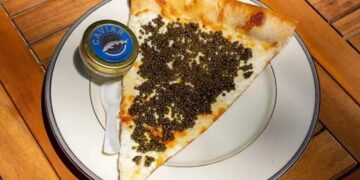 Philadelphia pizza shop sells $55 slices topped with caviar, served on gold plate with keepsake spoon