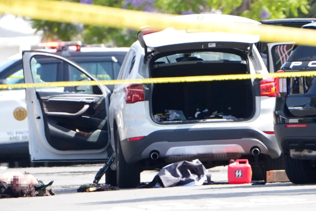 Crime scene with a red gas can displaying SS lightning bolts, near a body, an open car door, and a police vehicle.