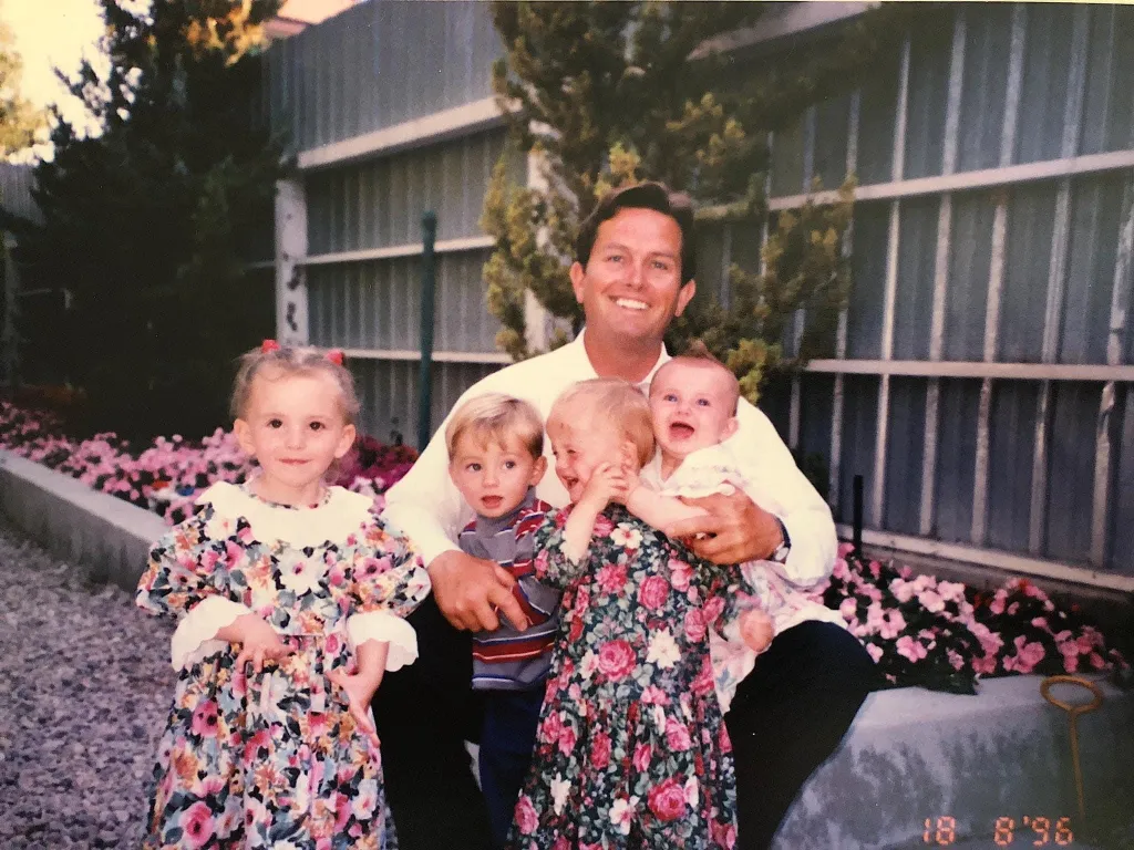 Janet with her father and siblings.