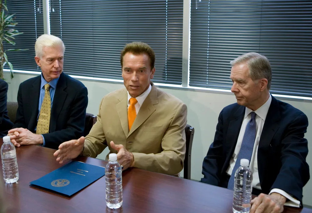 California Governor Arnold Schwarzenegger speaking at a meeting with former governors Gray Davis and Pete Wilson.