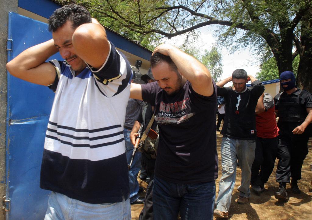 Four alleged members of the Mexican Sinaloa Cartel are escorted by Nicaraguan Police.