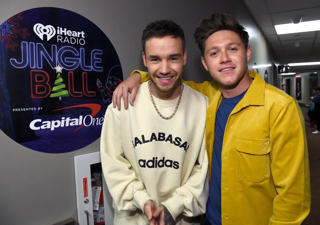 Liam Payne and Niall Horan posing at iHeartRadio's Jingle Ball, presented by Capital One.