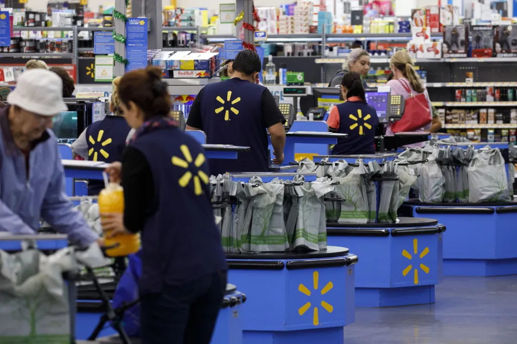 Walmart cashiers ring up shoppers in Burbank, California, ahead of Black Friday.