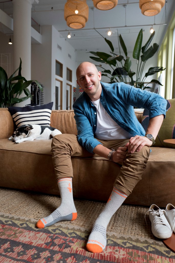 David Health, CEO and co-founder of Bombas, poses for a photo in his New York office.