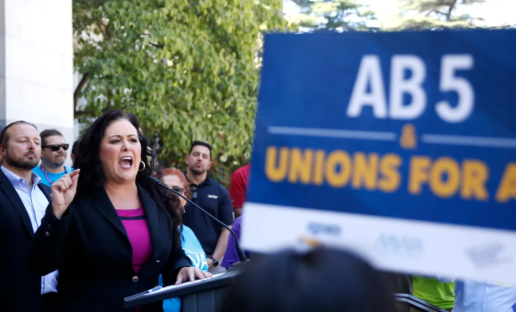 Lorena Gonzalez speaks at a rally about AB 5.