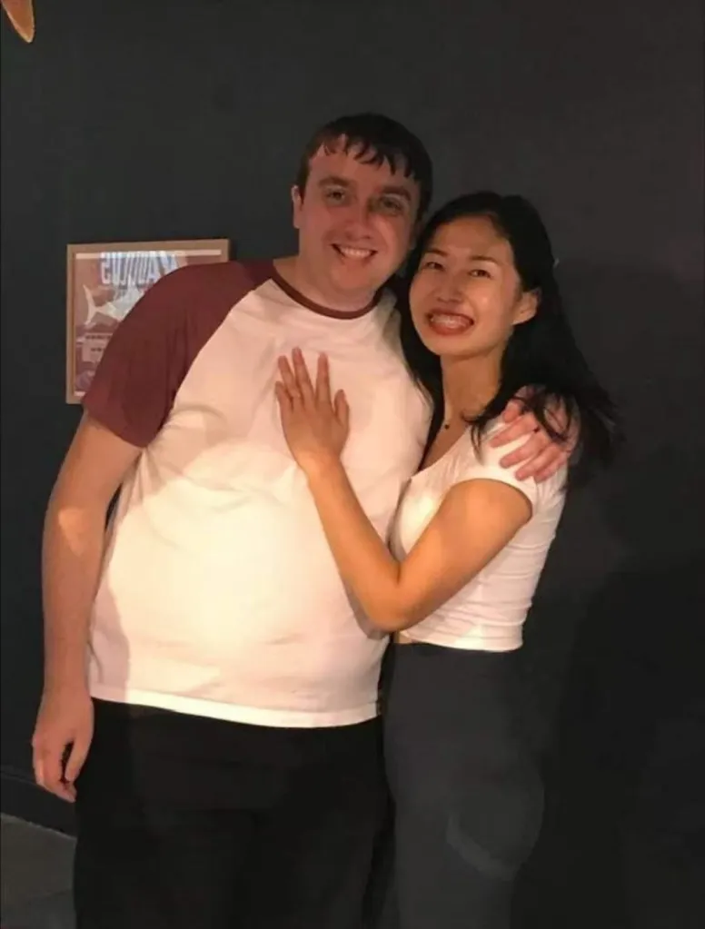 Leanne Zhang and Ben Donohoe smiling, with Leanne's arm around Ben.