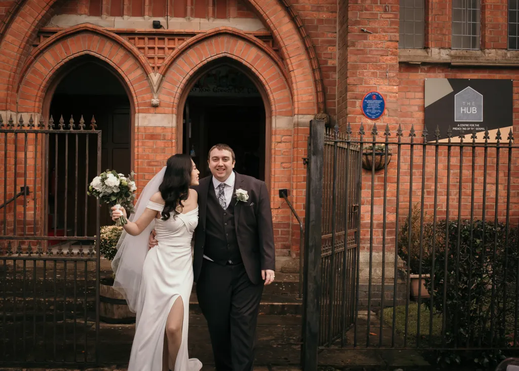 Leanne Zhang and Ben Donohoe leaving their wedding ceremony.