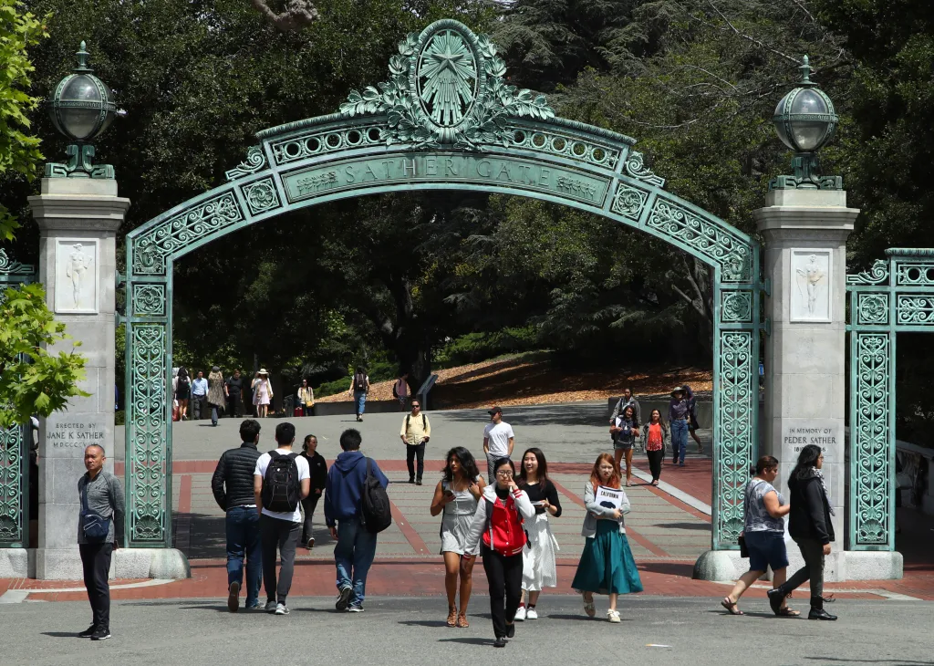 Students walk past Sather Gate on the University of California at Berkeley campus.