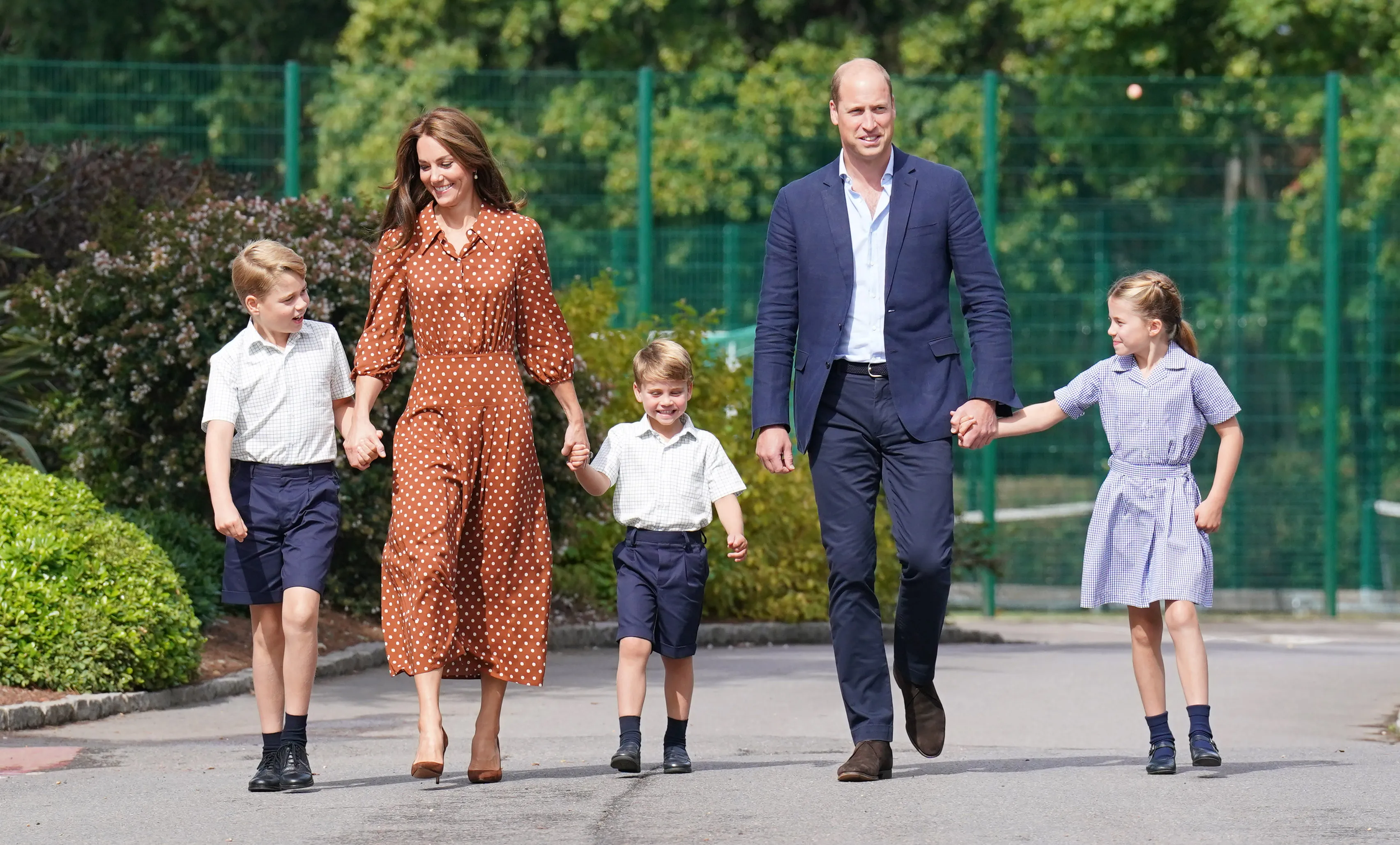  Prince George, Princess Charlotte and Prince Louis (C), accompanied by their parents the Prince William, Duke of Cambridge and Catherine, Duchess of Cambridge.