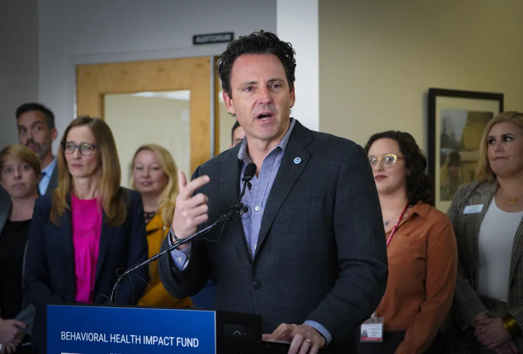 Nathan Fletcher speaking at a press conference for the Behavioral Health Impact Fund.