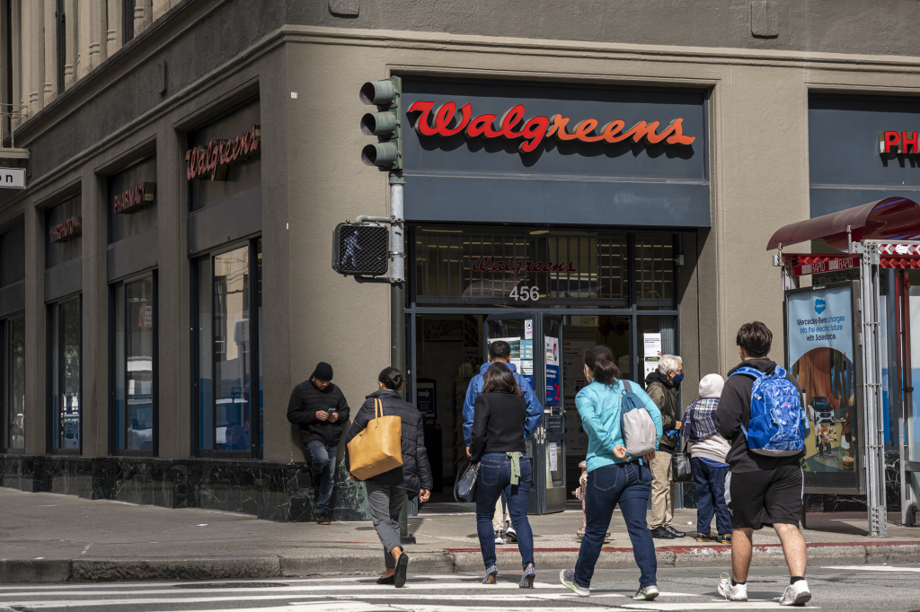 A Walgreens store in San Francisco with people walking outside and entering the store.