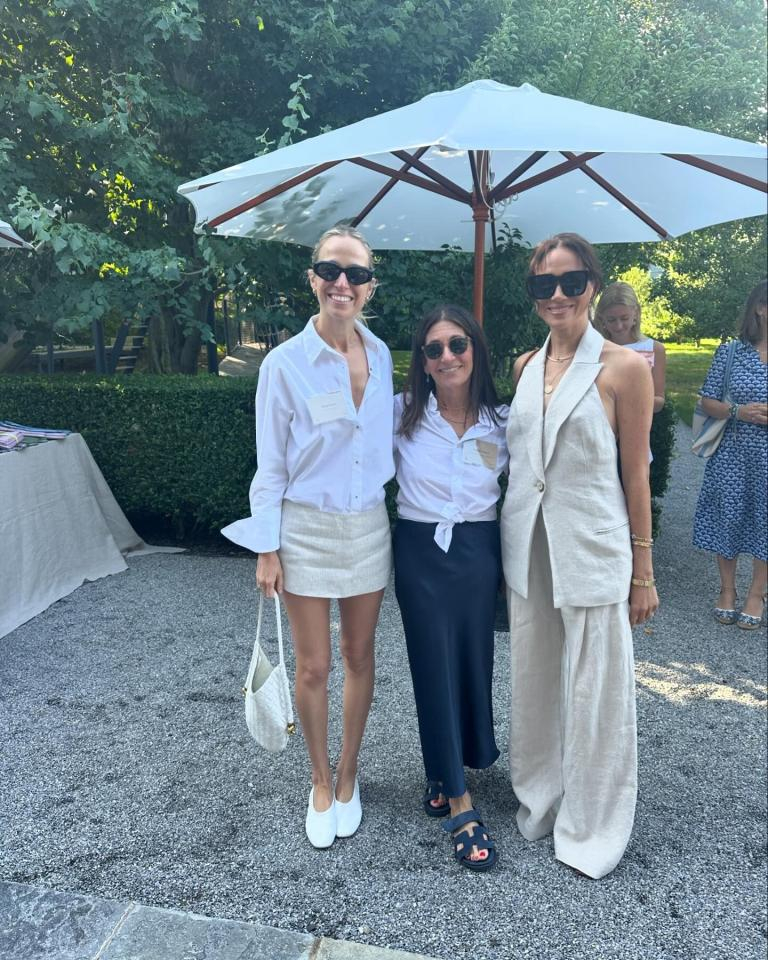 Meghan Markle (right) in a beige vest and beige pants and sunglasses, Bobbie Brown (center) in a white shirt and black pants and sunglasses. Misha Nonoo (far left) in a white shirt and beige mini skirt and sunglasses.