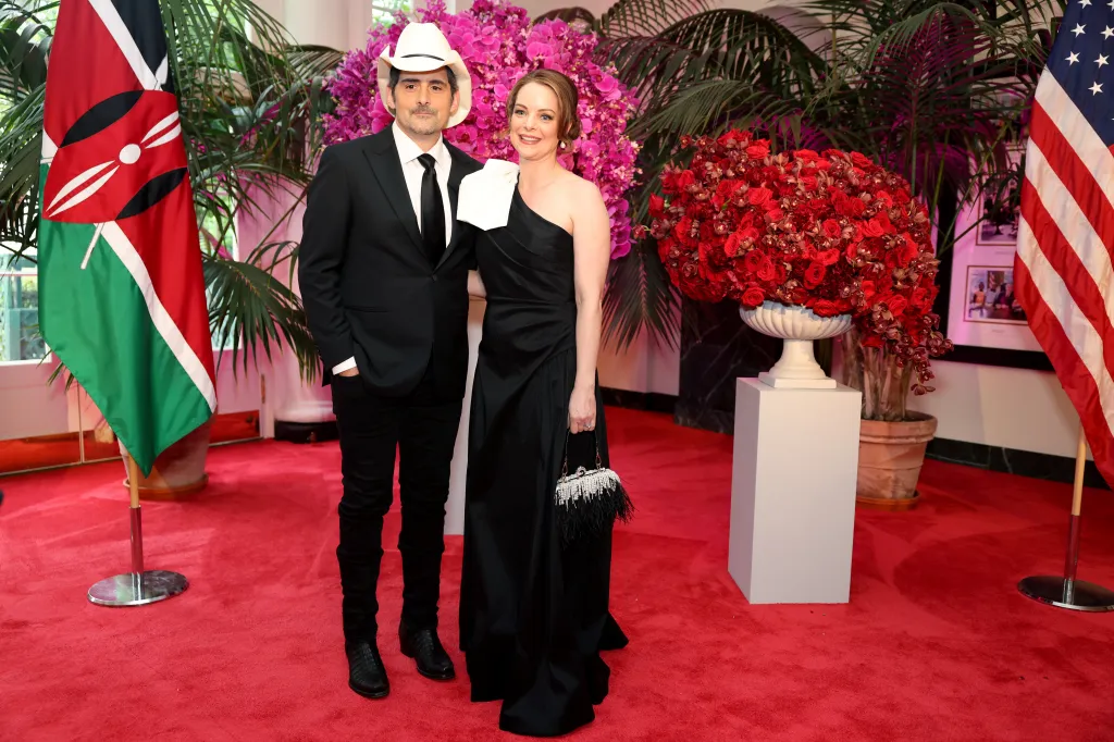 Musician Brad Paisley and Kimberly Williams-Paisley attend a state dinner for Kenya's president at the White House.
