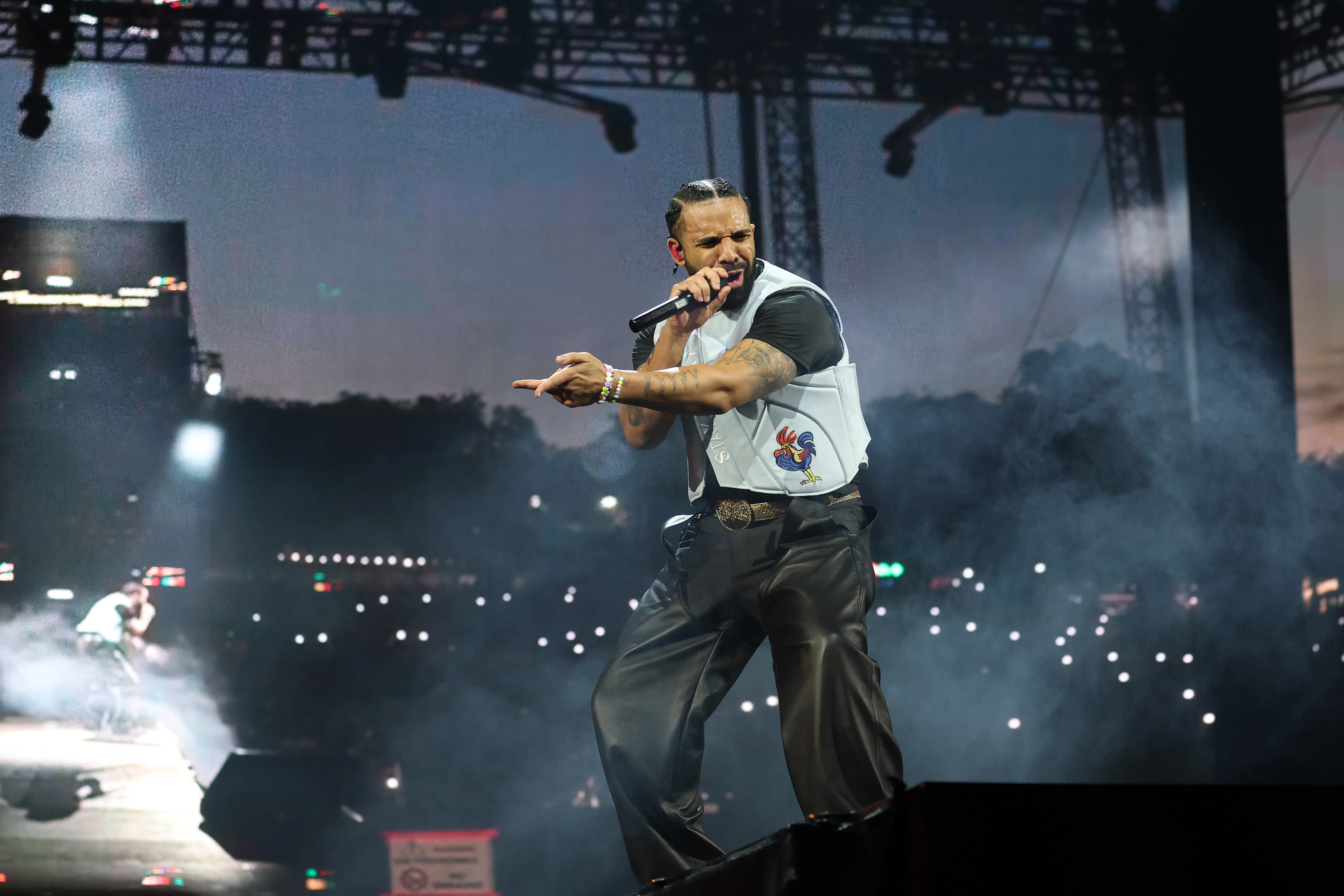Drake performing on stage at Wireless Festival 2025.