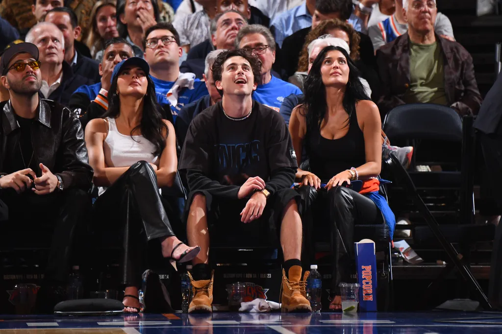 Kendall Jenner, Timothée Chalamet, and Kylie Jenner watch a game between the Boston Celtics and New York Knicks.