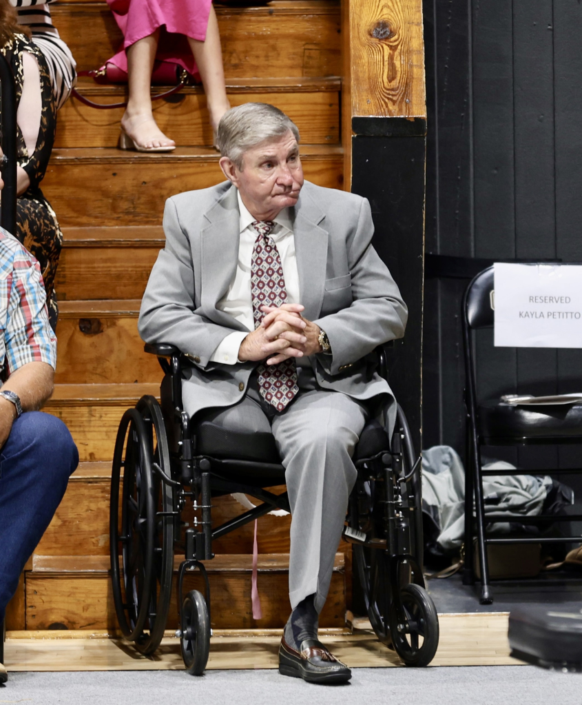 Jamie Spears in a wheelchair at daughter Maddie's graduation.