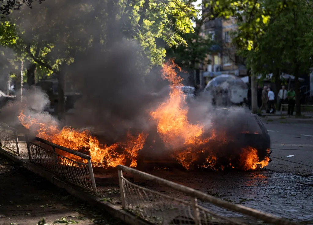 A car is engulfed in flames and smoke after a Russian glide bomb attack in Kramatorsk, Ukraine.