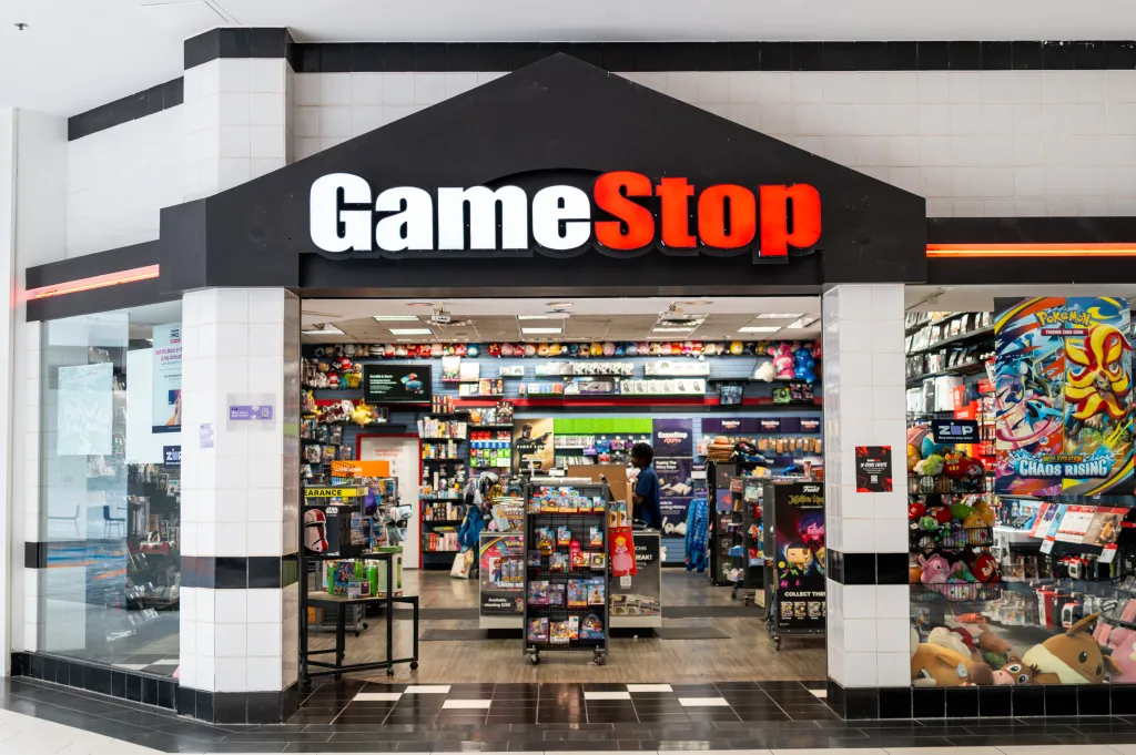 A storefront view of a GameStop store inside a mall.