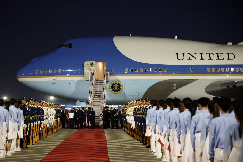 President Trump arriving on Air Force One in Beijing, China, welcomed by Chinese youth and military honor guard.