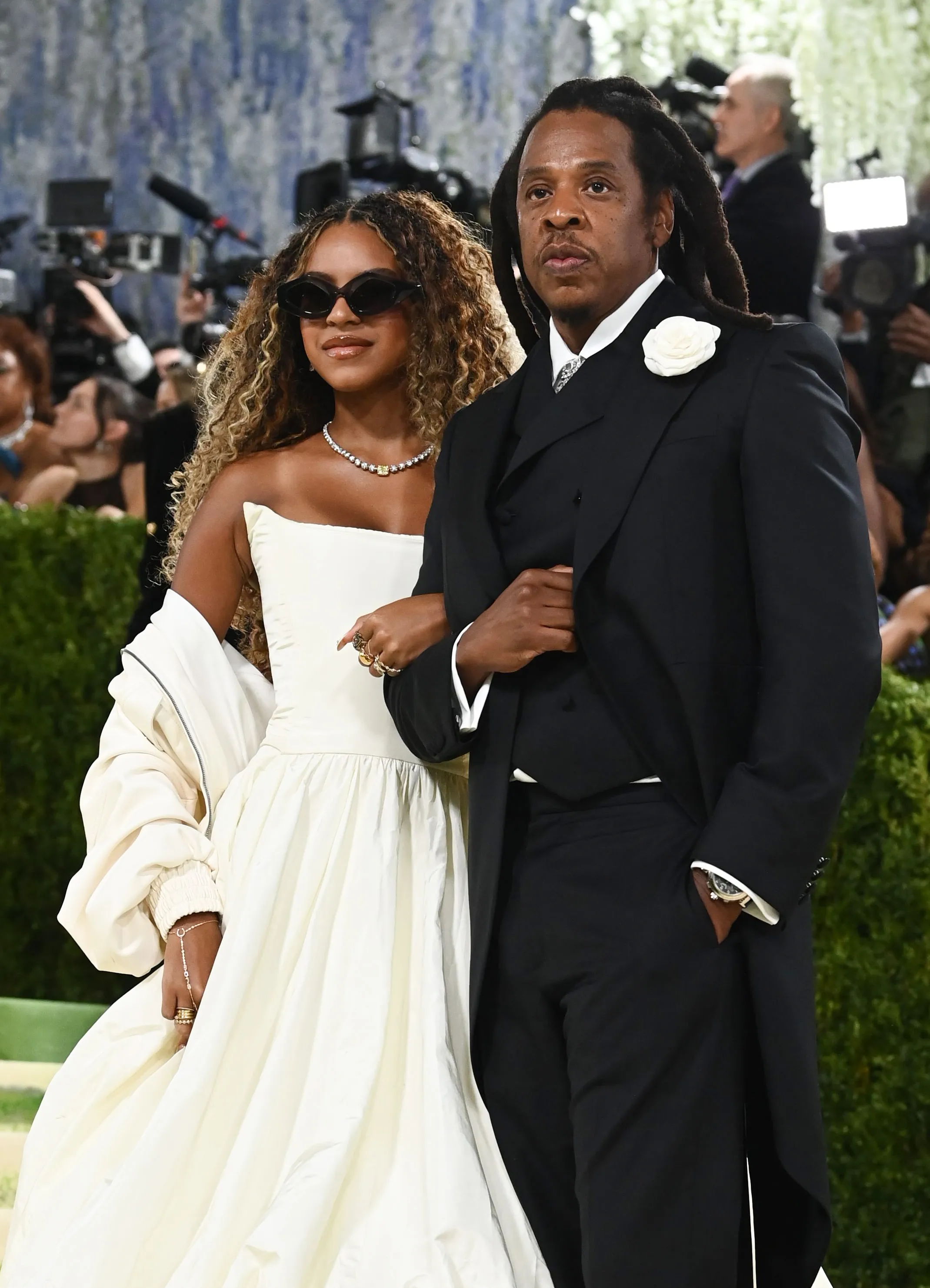Blue Ivy Carter and Jay-Z arriving at the Met Gala.