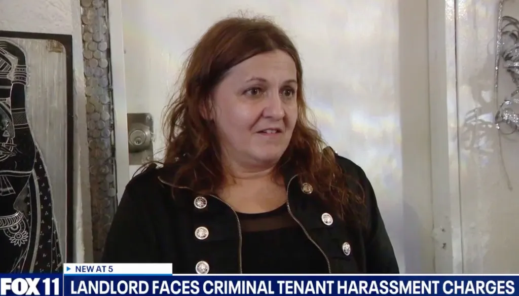 Nela Petrusan, an apartment building owner, shown on screen with 