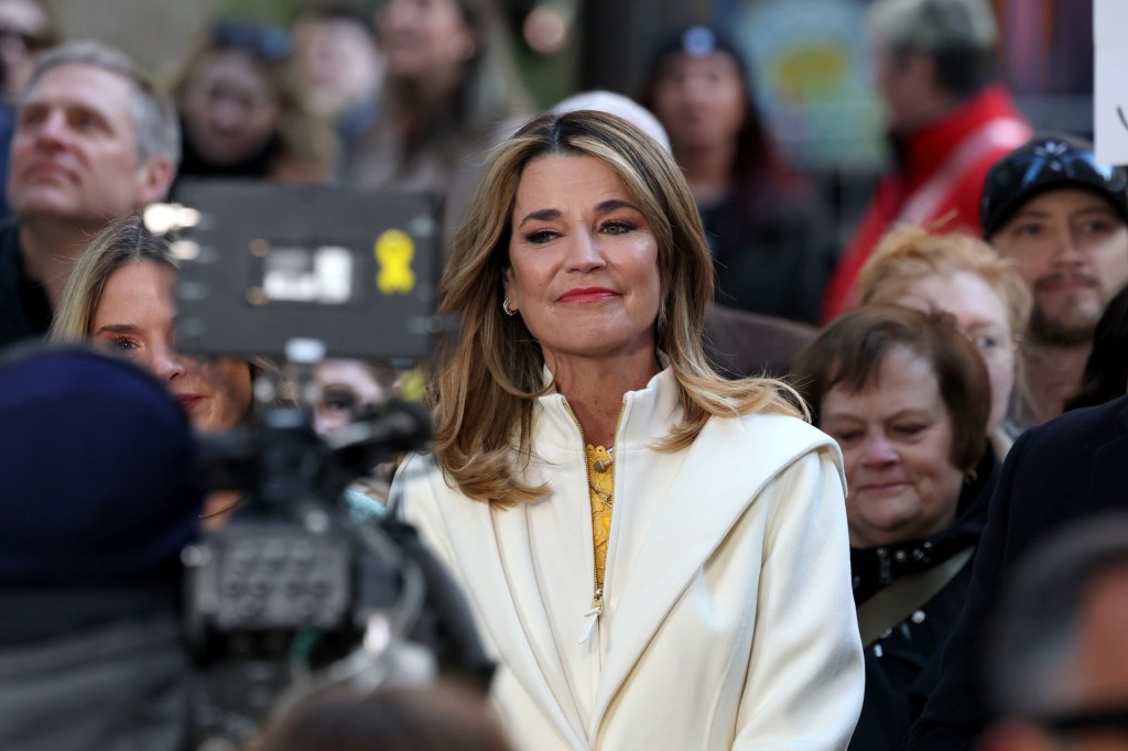 Savannah Guthrie appears emotional on her first day back at the Today show after her mother's disappearance.