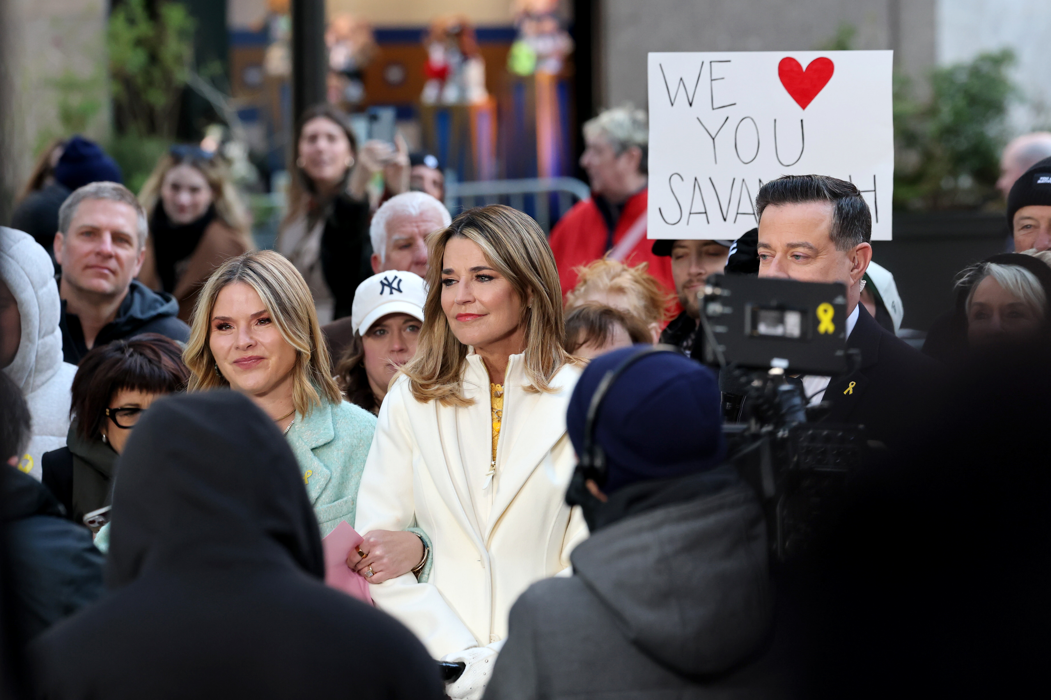 Savannah Guthrie and Jenna Bush Hager among a crowd on the 