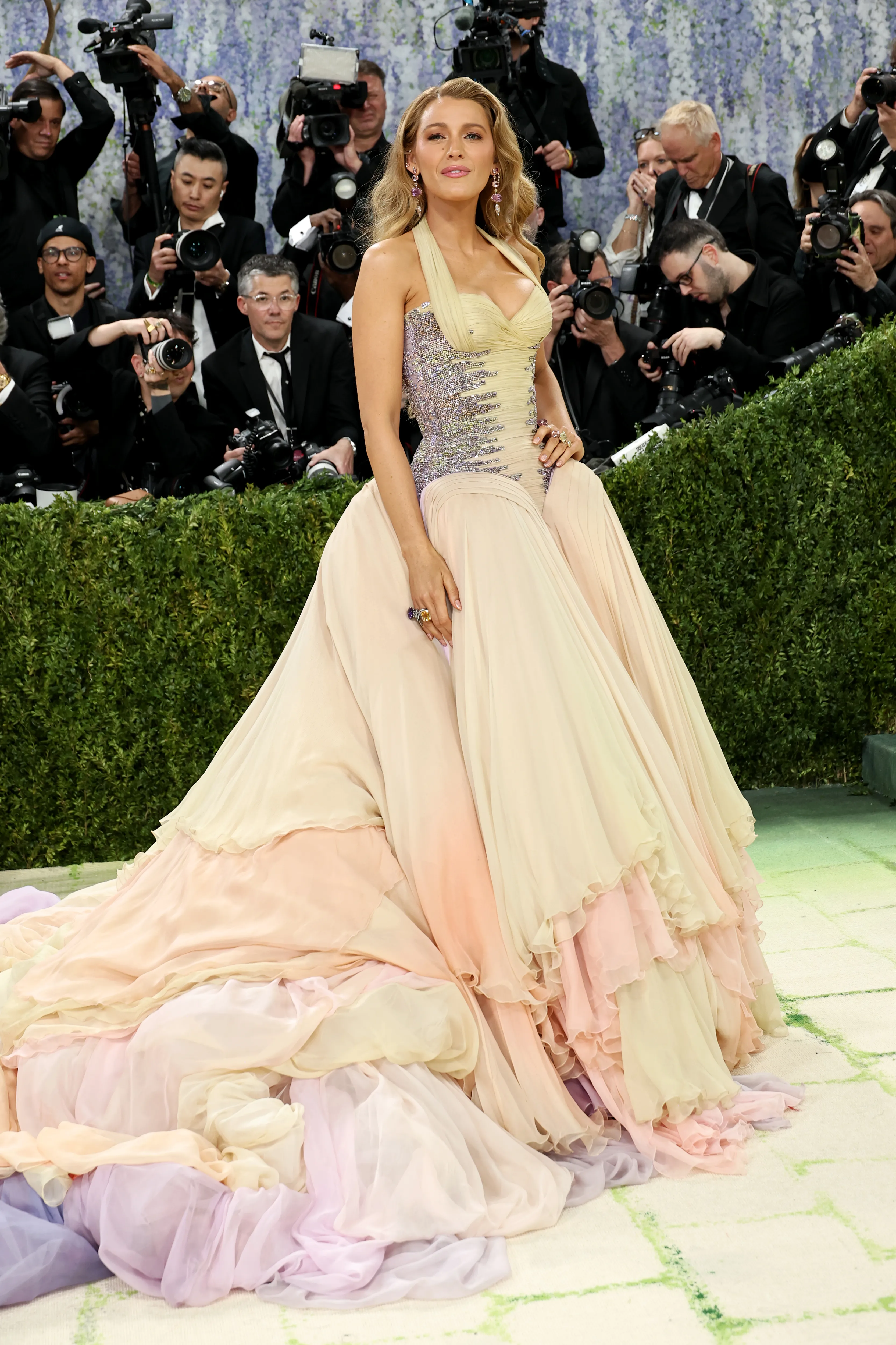 Blake Lively at the 2026 Met Gala in a pastel layered gown and jeweled bodice.