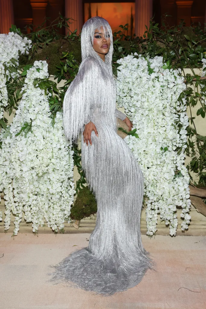 Teyana Taylor in a silver fringed gown and hair at the Met Gala.