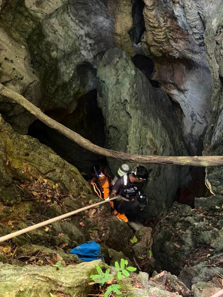Members of a rescue team work to save seven people trapped in a cave, at Xaisomboun Province, Laos.