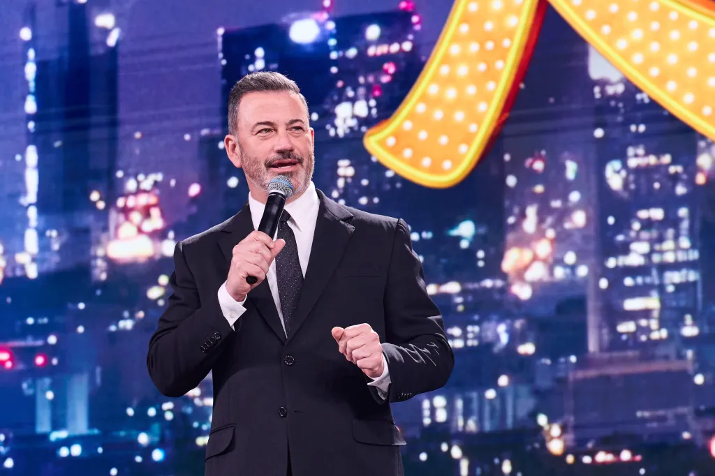 Jimmy Kimmel speaking into a microphone.
