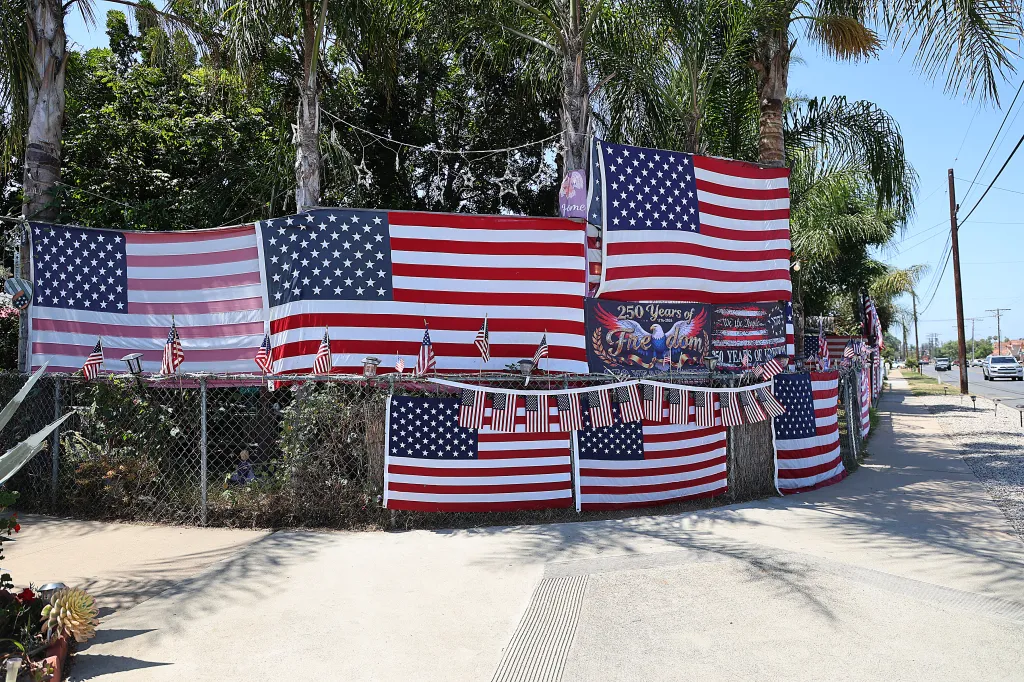 Numerous American flags and banners celebrating