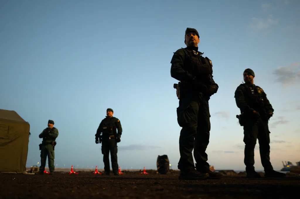 Spanish civil guards secure an area at the port of Granadilla de Abona.