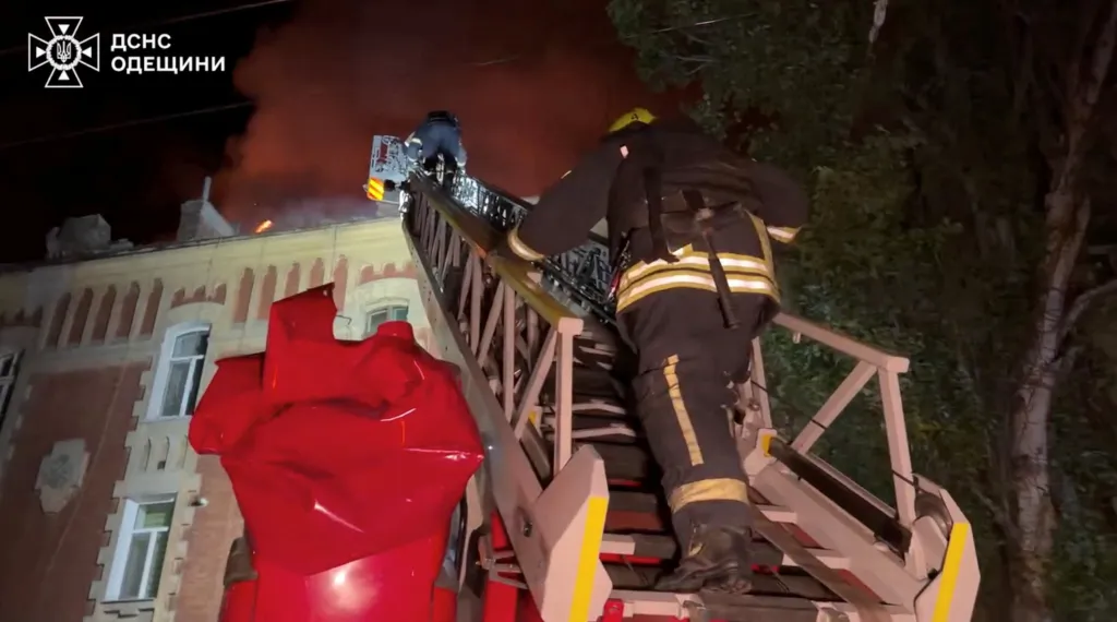 Firefighters work at the site of a Russian drone strike, amid Russia's attack on Ukraine, in the Odesa region, Ukraine, in this screengrab obtained from a handout video released on May 18, 2026.