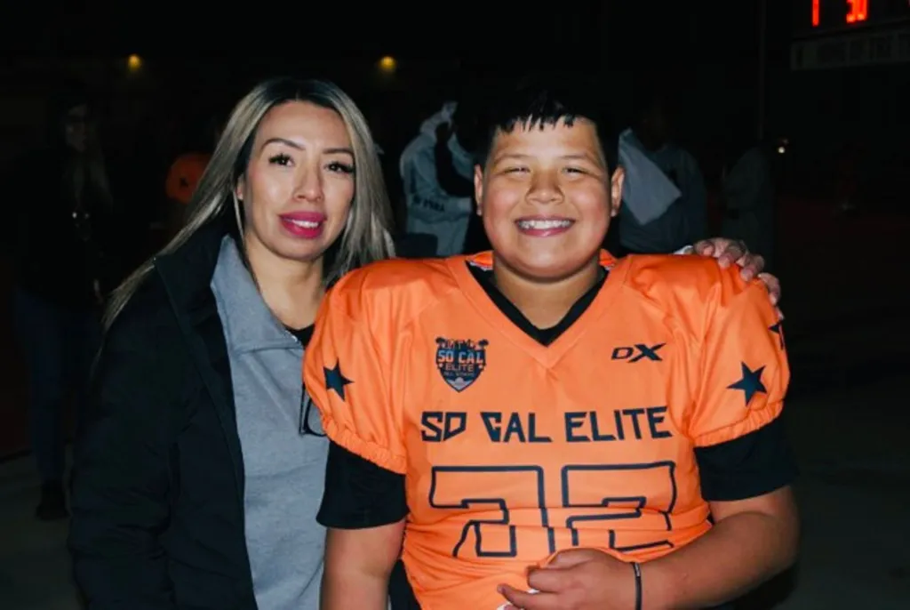 Jeremy Rosales in an orange 