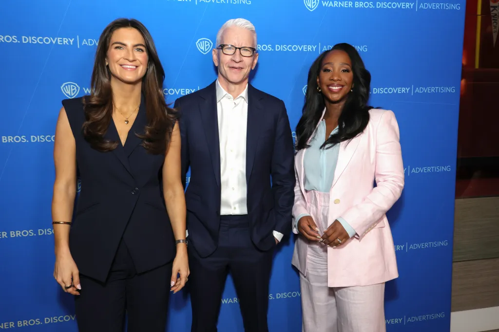 Phillip is seen far right alongside fellow CNN primetime anchors Kaitlan Collins (far left) and Anderson Cooper.