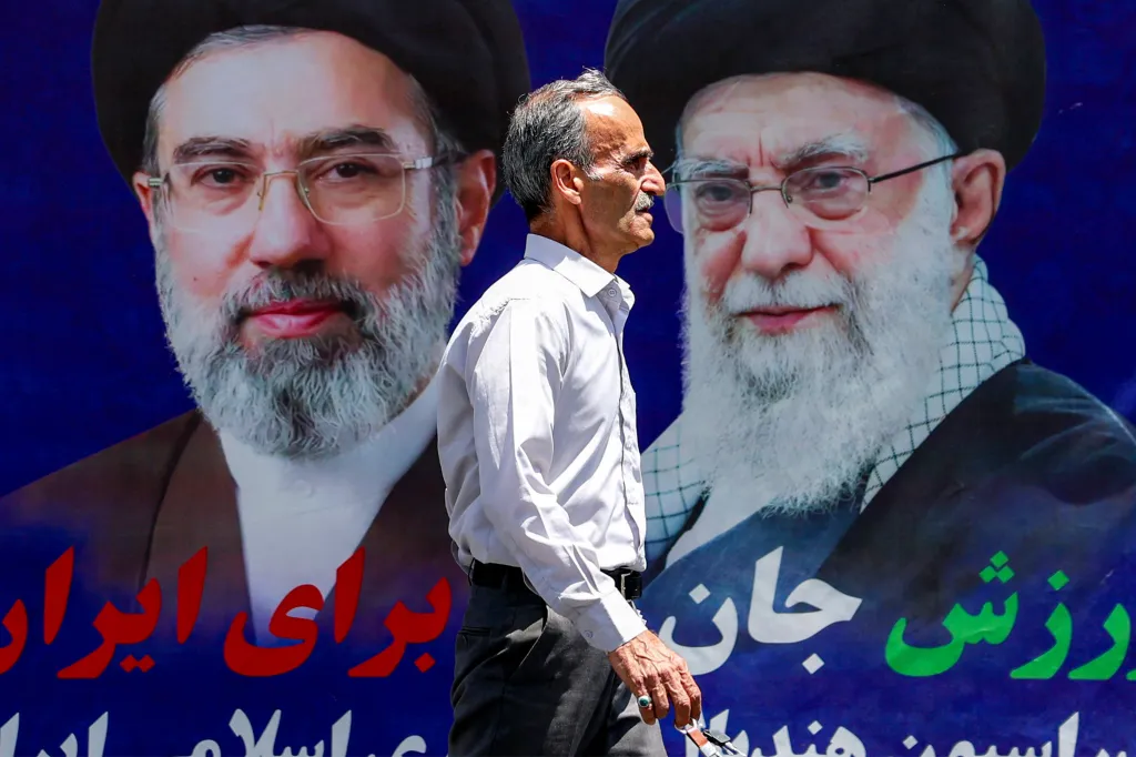 A banner depicting Iranian Supreme Leader Mojtaba Khamenei and his father, Ali Khamenei, on the streets of Tehran on May 6, 2026.