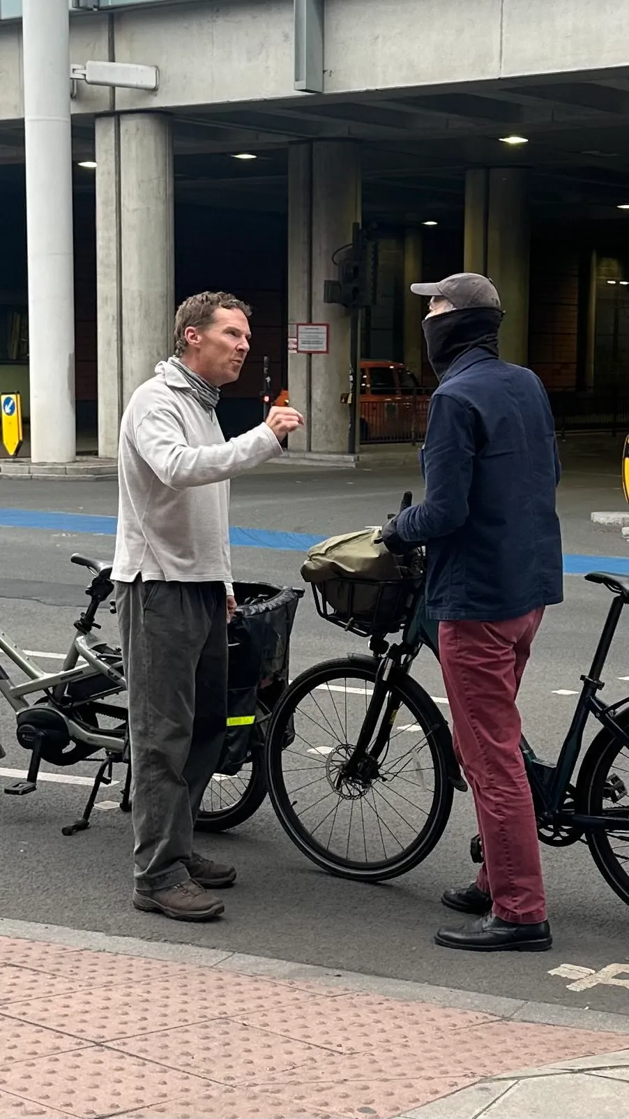 Benedict Cumberbatch in an altercation with a masked cyclist.