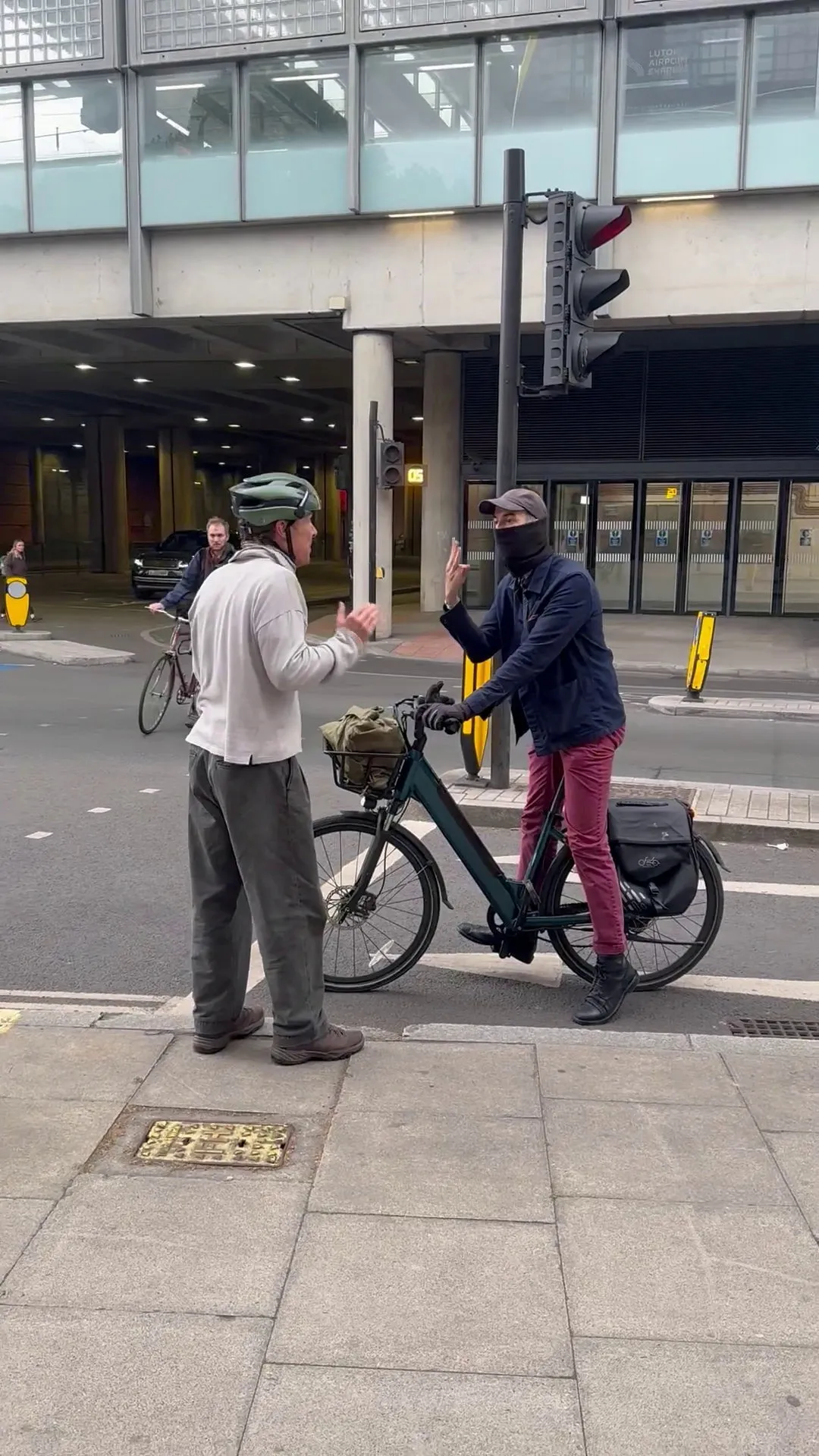 Benedict Cumberbatch in a cycling road rage incident with a masked cyclist.