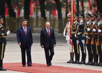 Days After Hosting Trump, Xi Deepens Ties With Putin