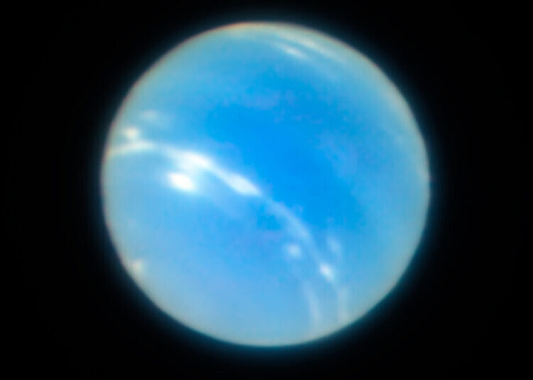 This Moon of Neptune Might Have Survived a Wrecking-Ball Event