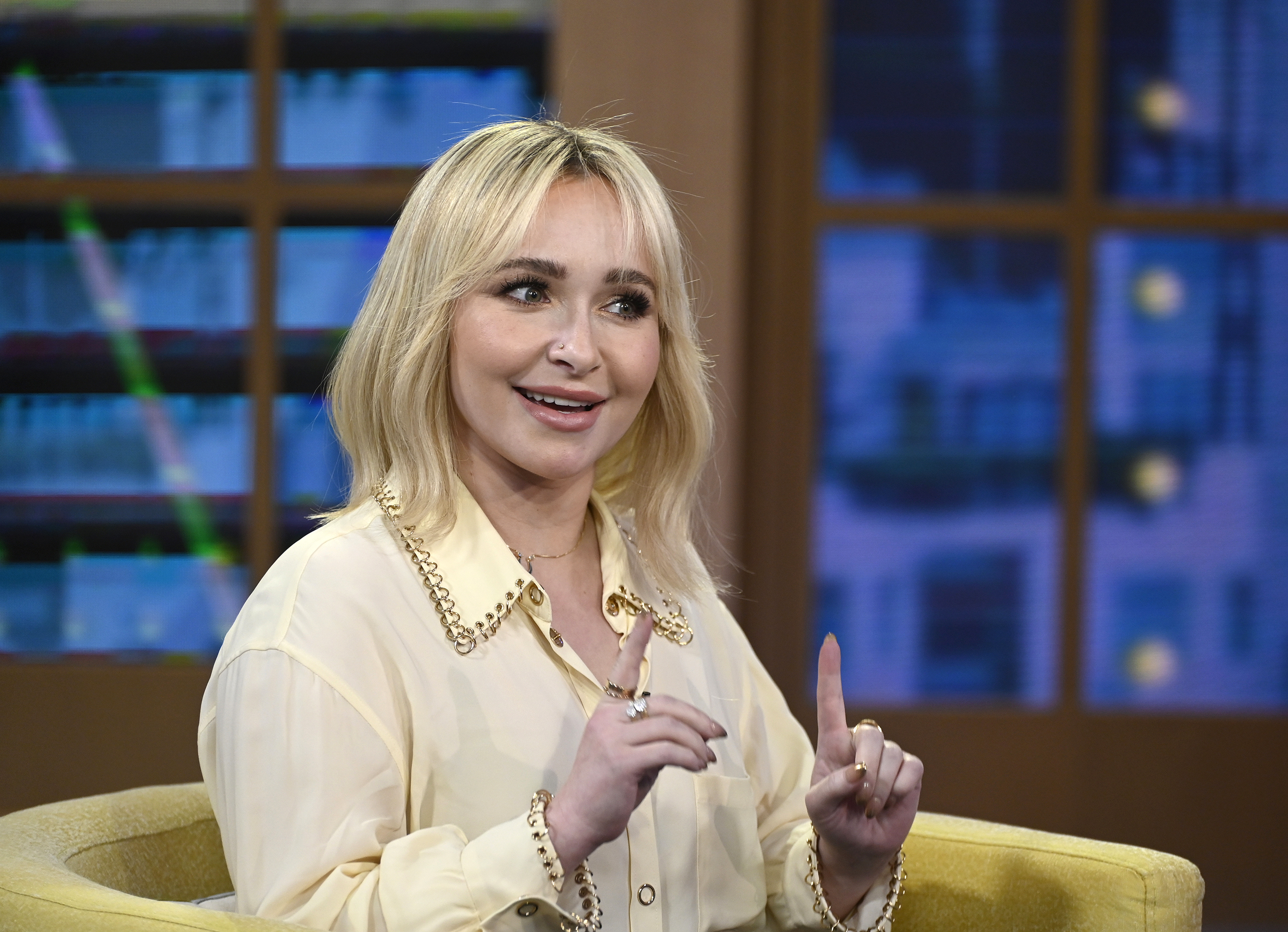 Hayden Panettiere speaking during a TV interview.