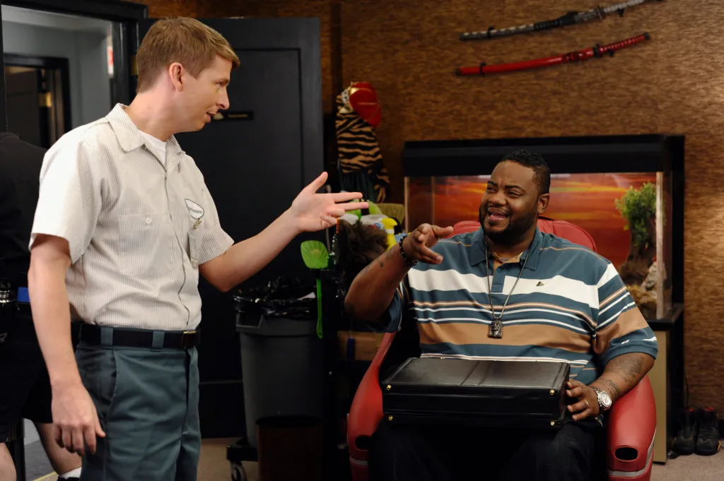 Jack McBrayer as Kenneth Parcell and Grizz Chapman as Grizz in a scene from the comedy series 