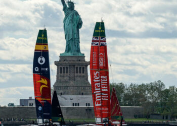 High-Speed Sailboats Race Past the New York Skyline